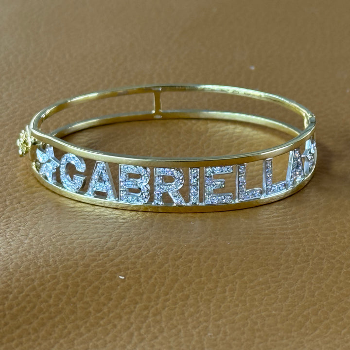 Yellow gold and diamond bracelet with GABRIELLA writing