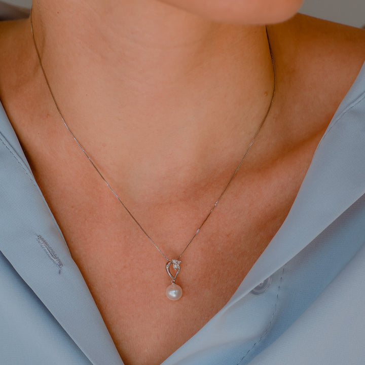 Comete choker ketting parels in goud en diamanten drop GLP611