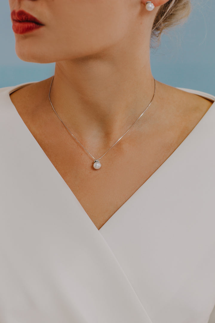 Comete parelketting in goud en diamanten GLP545