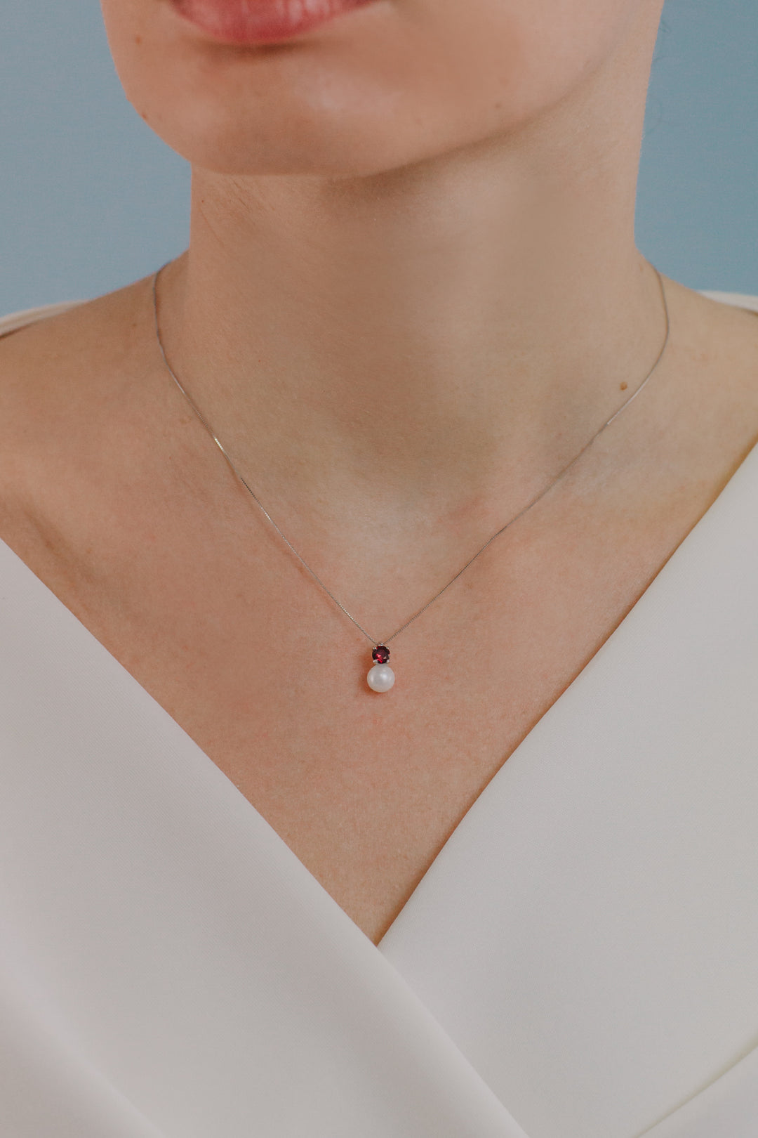 Comete ketting in goud, parels en ronde robijn GLP614