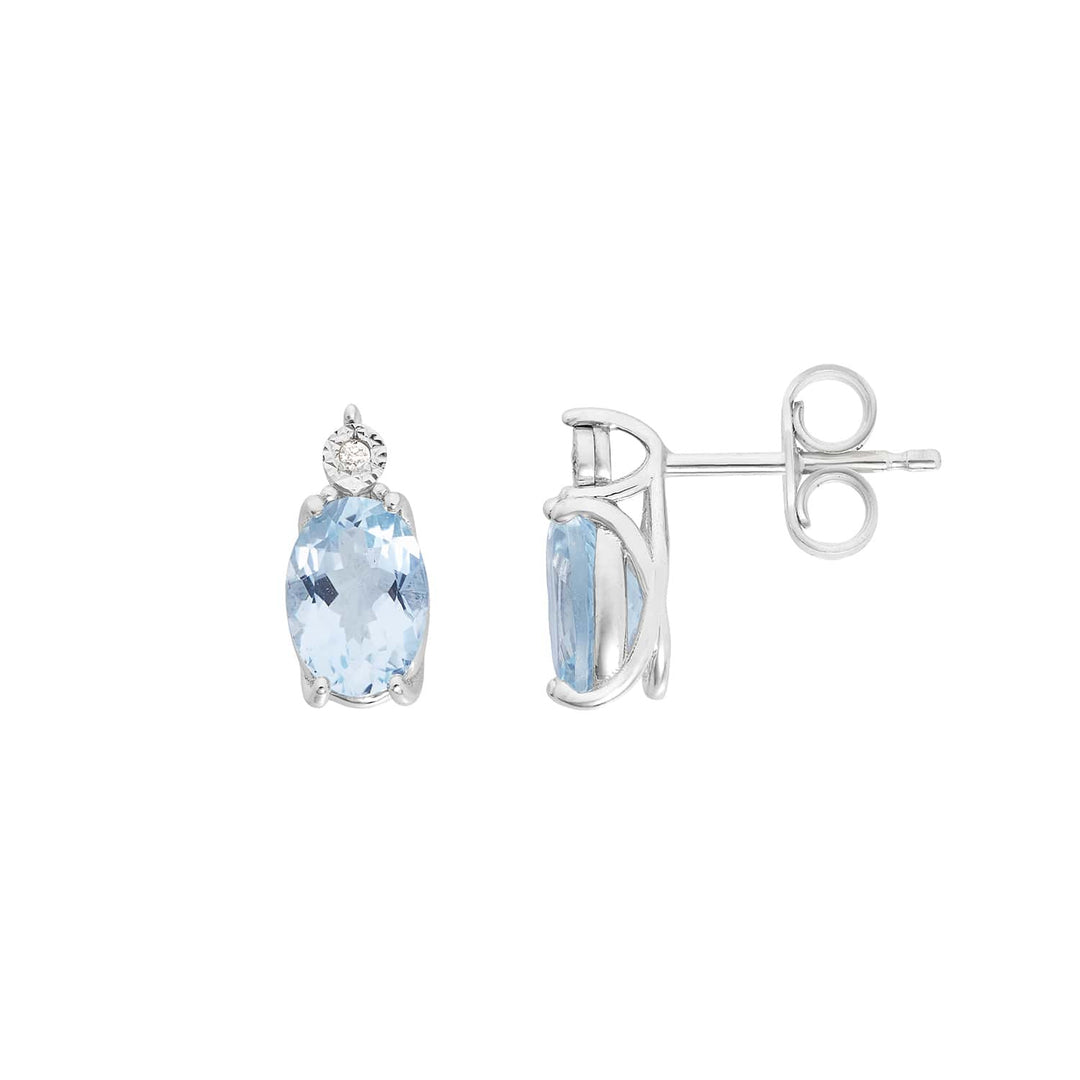 Comete Earrings 375‰ white gold, diamonds and oval aquamarine KORQ001