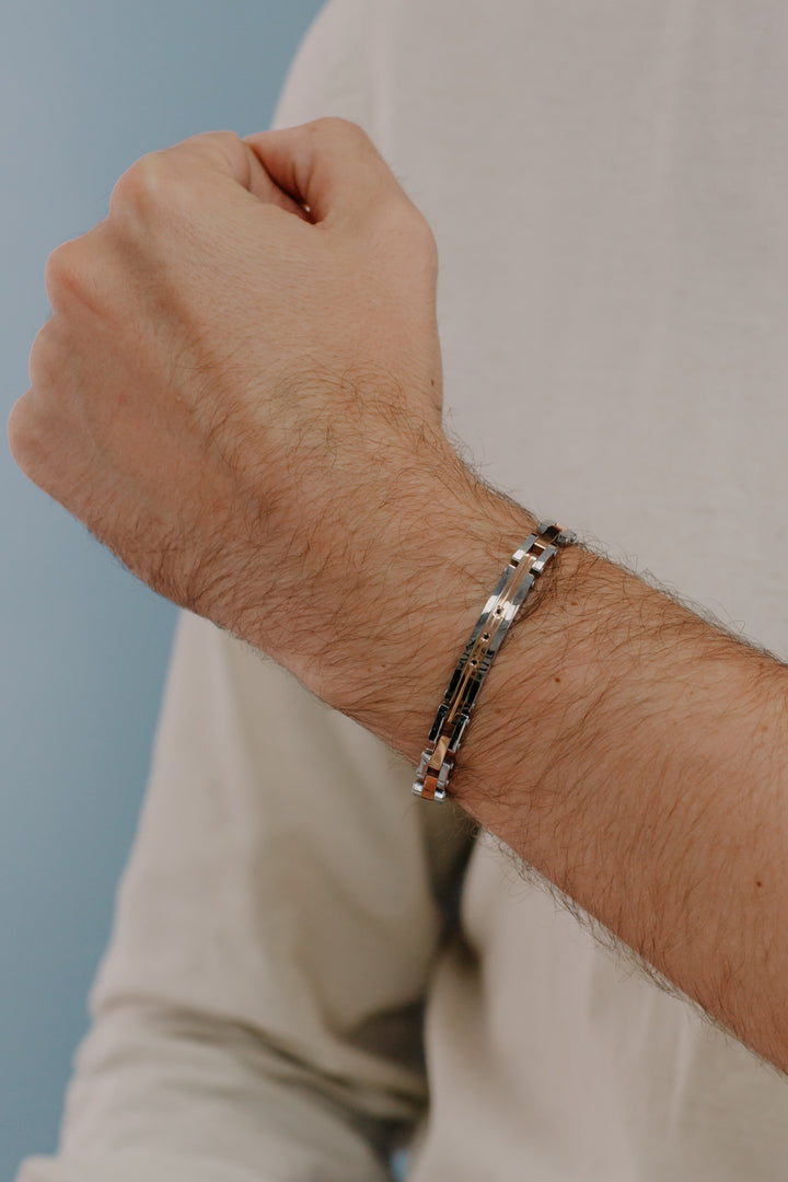 Comete-Armband aus rosa PVD-Stahl und Zirkonen UBR1038