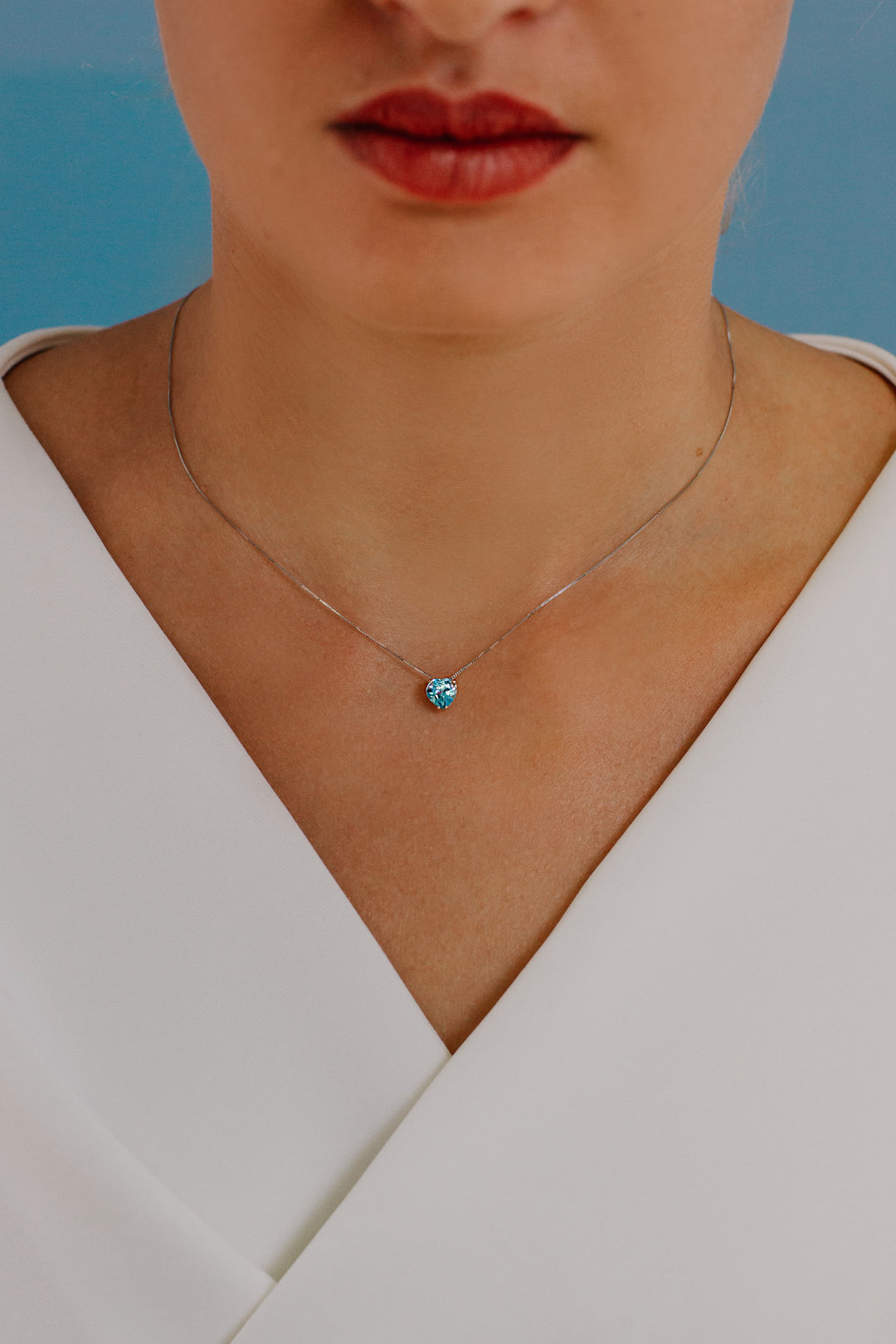 Comete ketting in roségoud en blauw topaas hart GLB1546