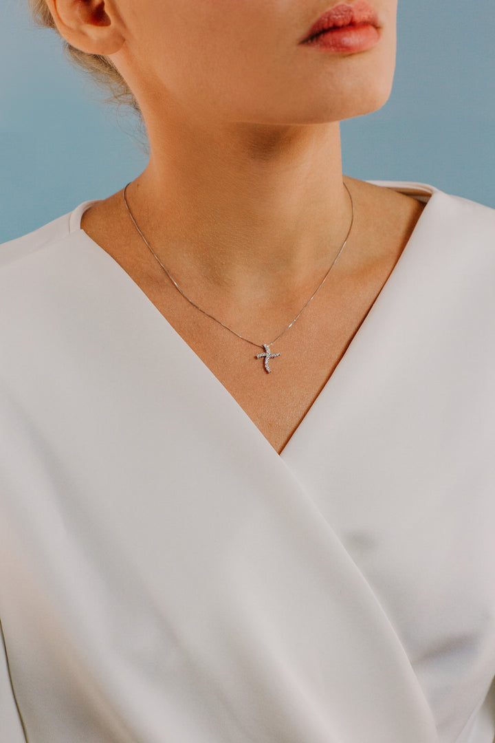 Comete Wave kruisketting in roségoud en diamanten GLB1528