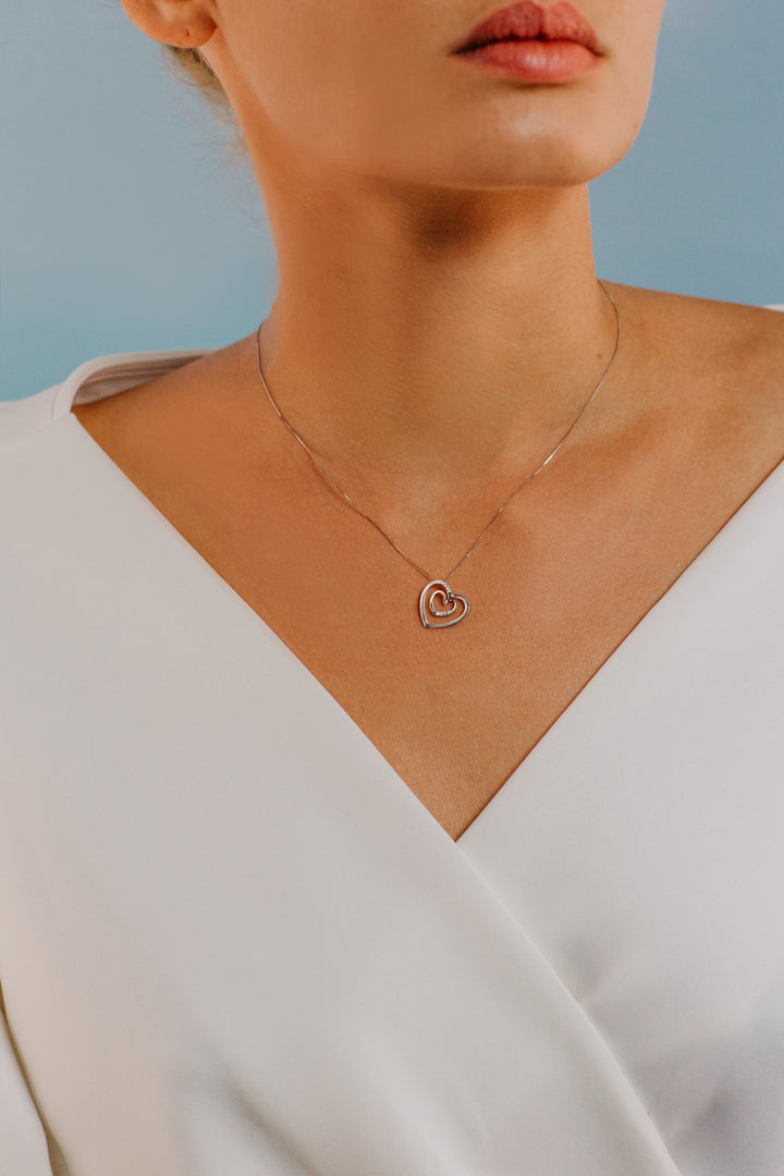 Comete hartketting in goud en diamanten GLB1339