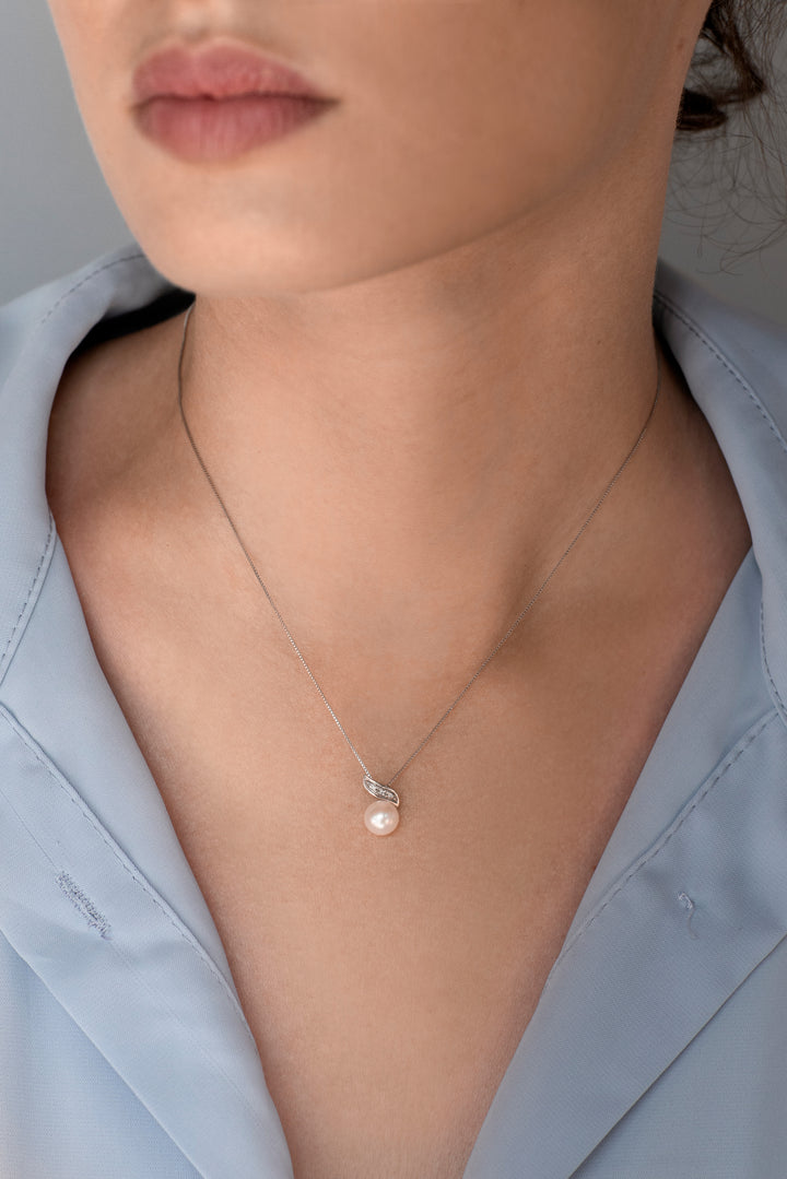 Comete ketting parels in goud en diamanten GLP612