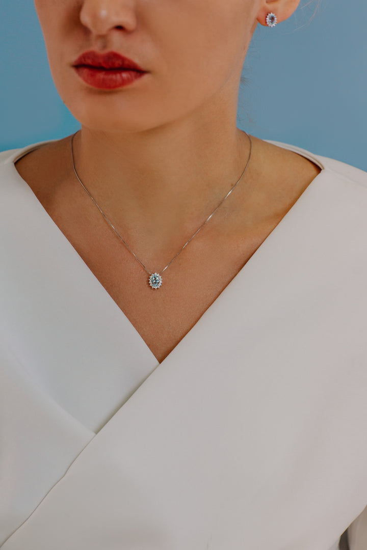 Comete-Goldhalskette mit Diamanten und ovalem Aquamarin GLQ286
