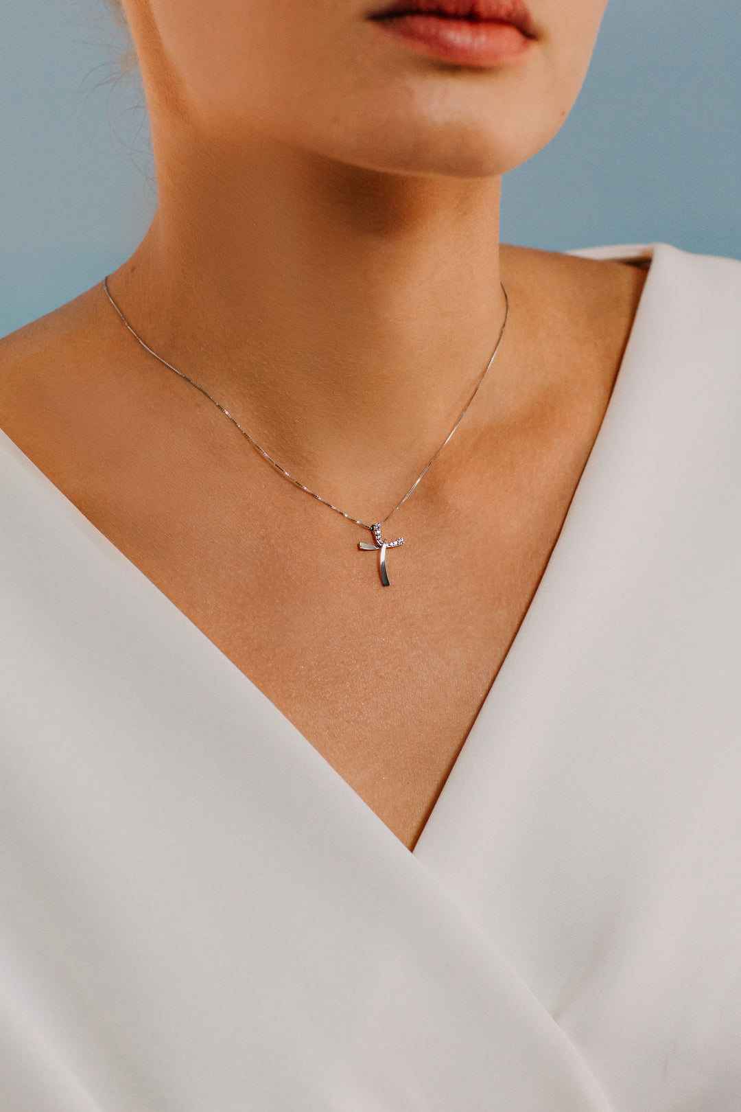 Comete Gold- und Diamant-Kreuz-Halskette GLB1563