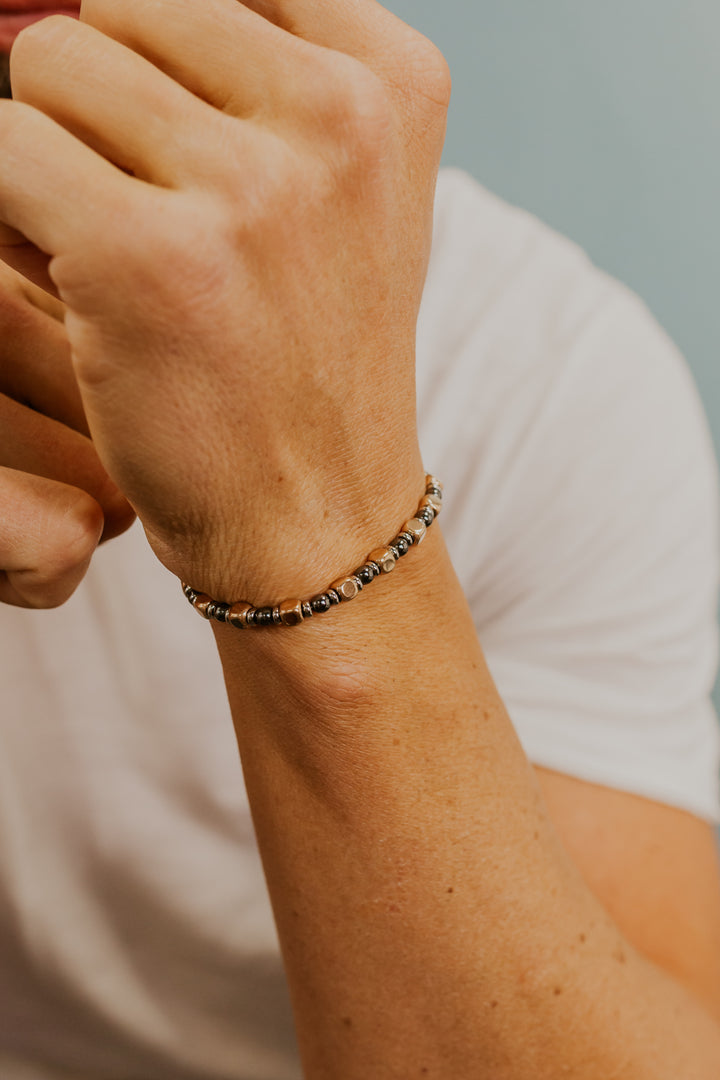 Comete stalen en hematiet armband met rosé PVD UBR1183