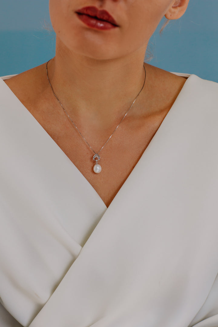 Comete ketting parels in goud en diamanten GLP547