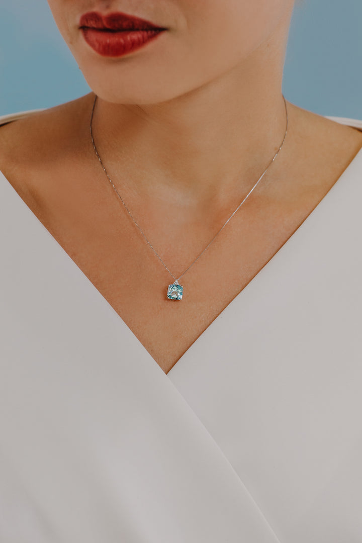 Comete ketting in goud en antiek blauwe topaas GLB1348