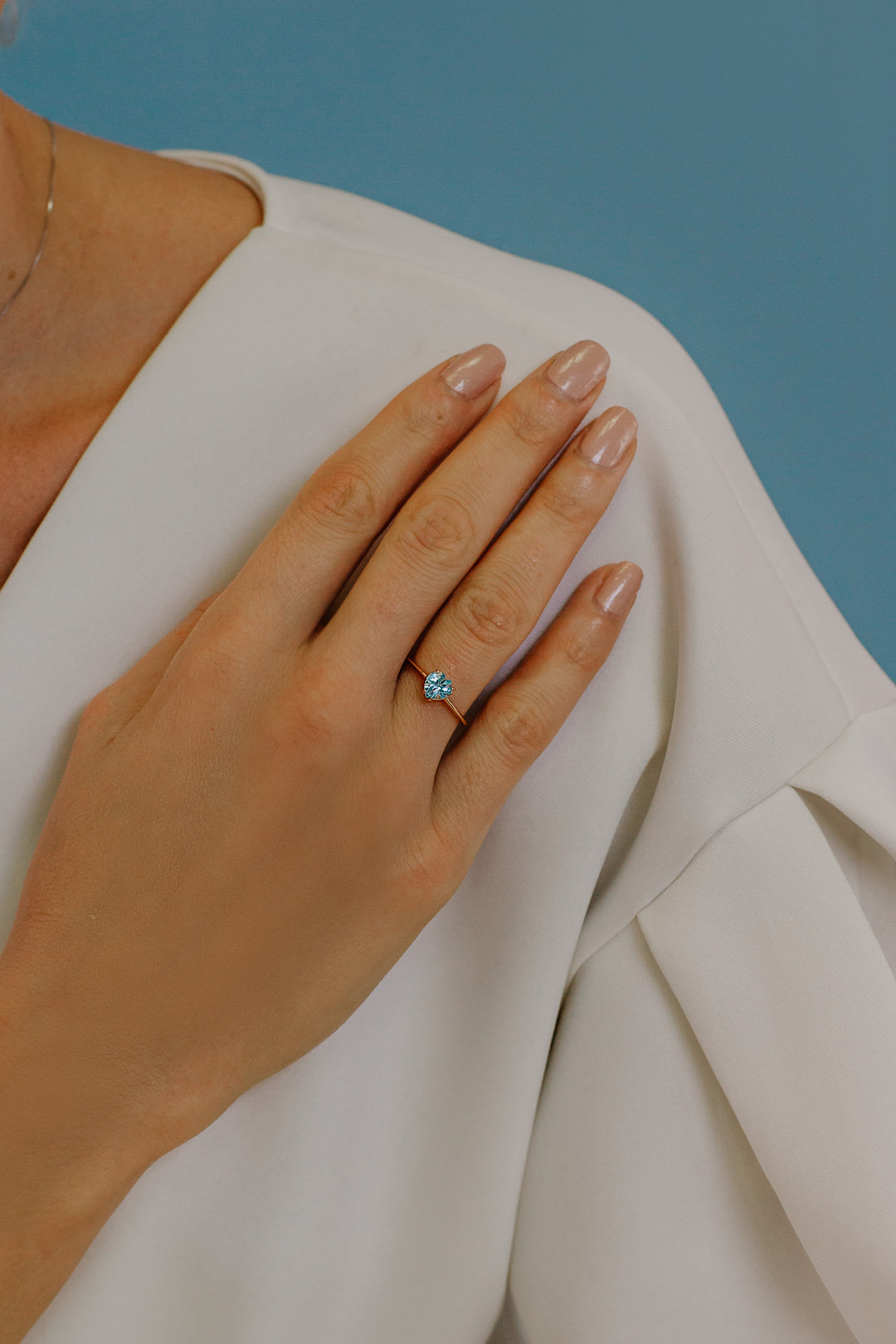 Comete-ring in roségoud en hartvormige blauwe topaas ANB2544