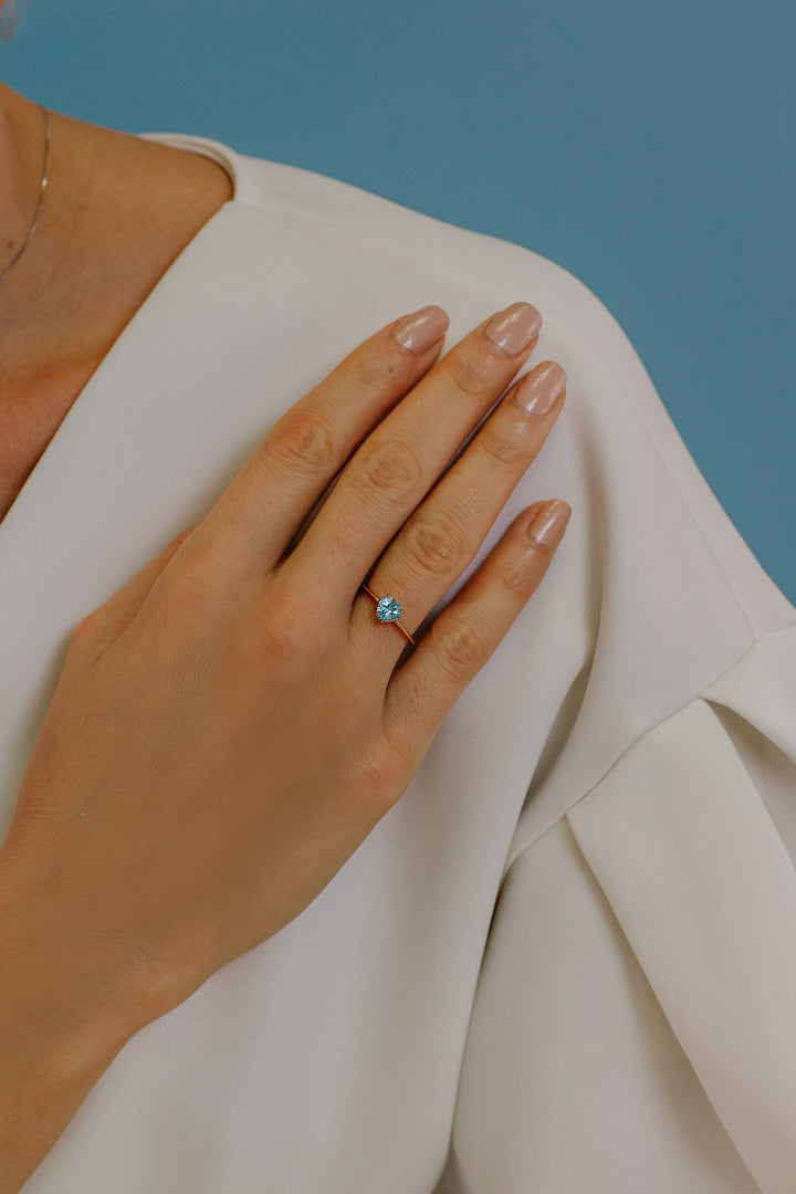Comete-ring in roségoud en hartvormige blauwe topaas ANB2544