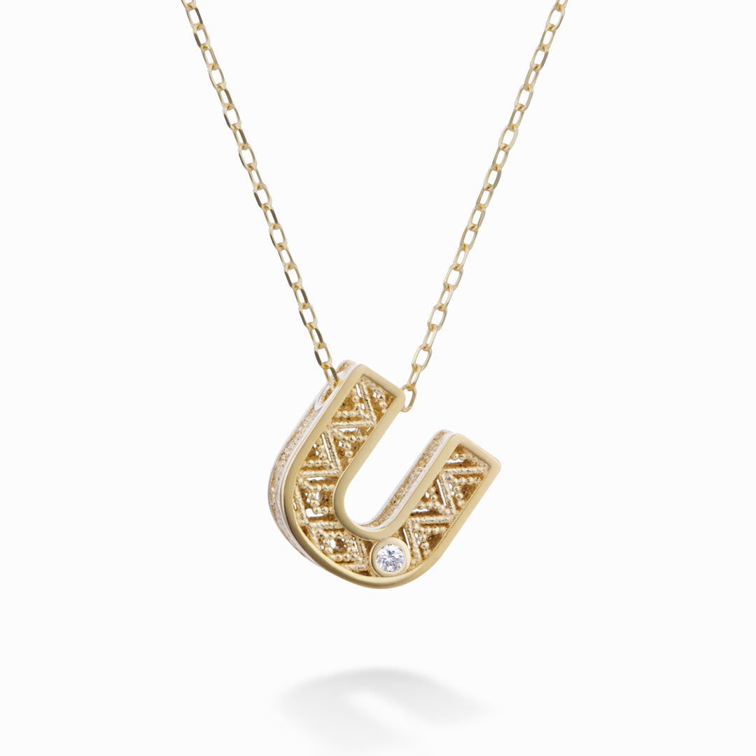 Mikiko cl 18k letter u geelgoud diam. ct.0,01 MDLETUO1