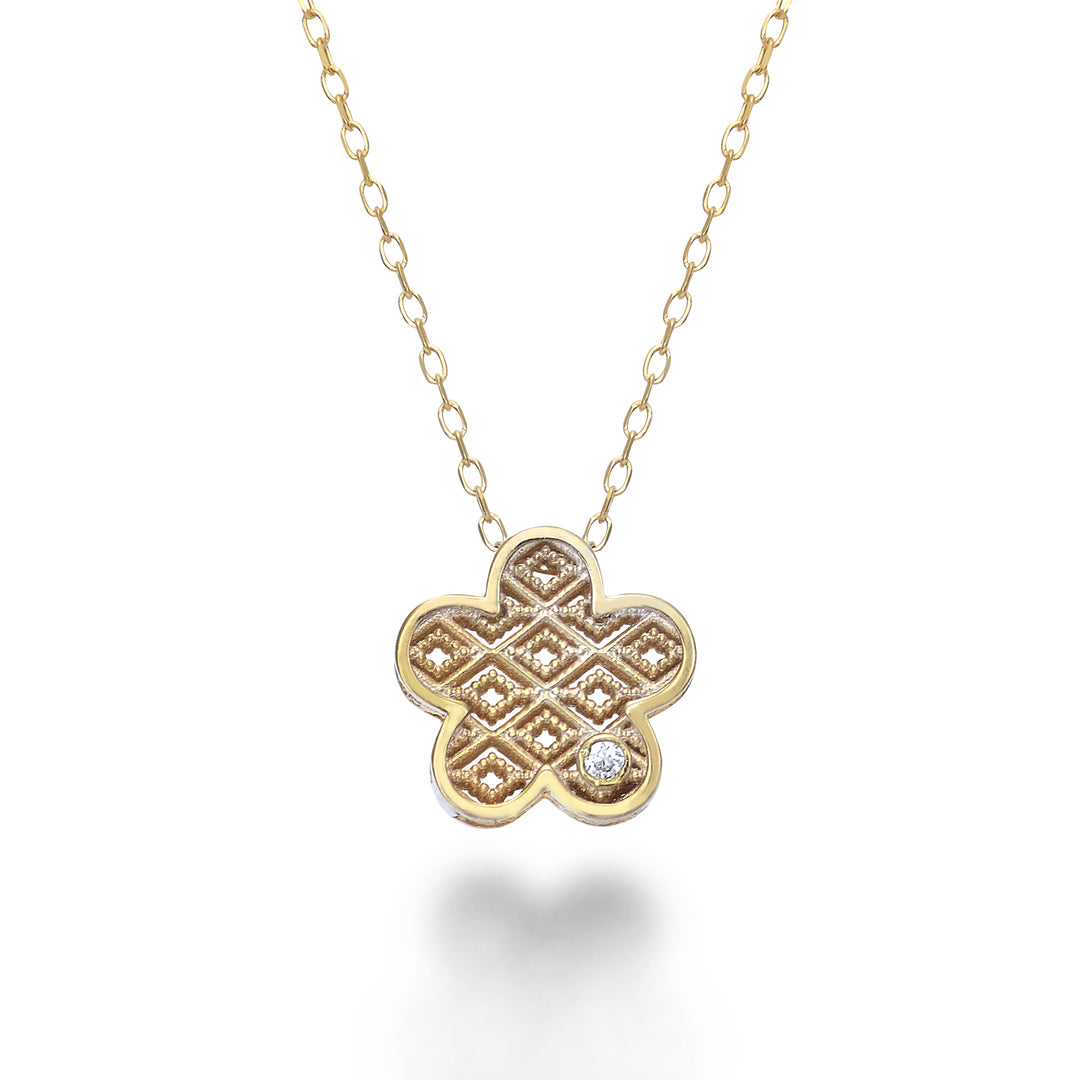Mikiko cl 18k Gelbgold Blumendiamant. ct.0,01 MDFIOREO1