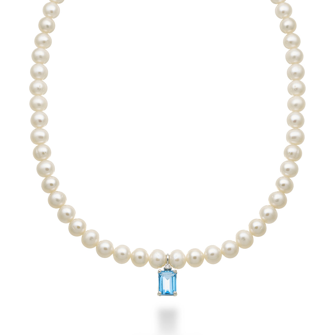 Mikiko cl 18k fw 5,5/6 hellblauer Schweizer Topas Okt. 6x8 ct.2,10 Durchm. 0,02 ct Federring MC1575O4TPSW55