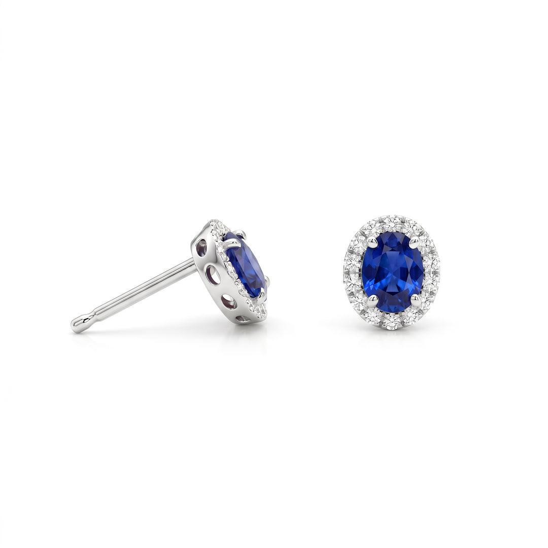 Nihama or 18k oval sapphire 5x4 with diamond outline NO5184O4ZFD