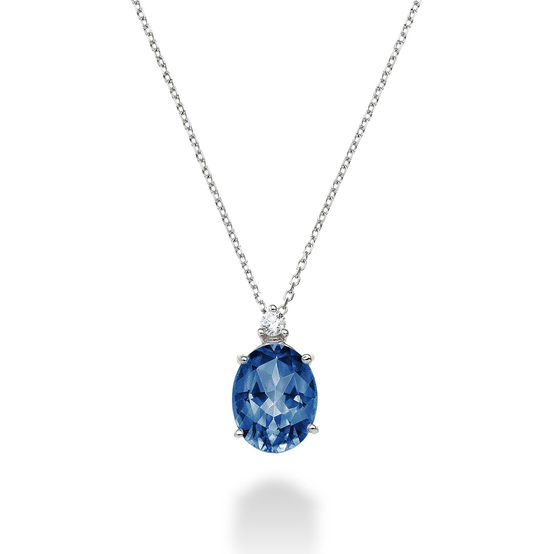 Mikiko cl 18k ovale Londense blauwe topaas 7x9 ct.2,00 diam. 0,04 ct MD5110O4TPBL