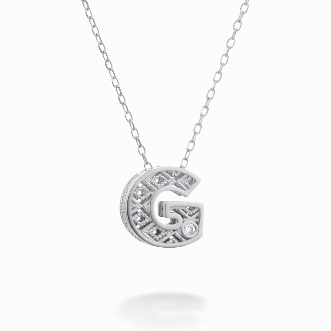 Mikiko cl 18k letter g witgoud diam. ct.0,01 MDLETGO4