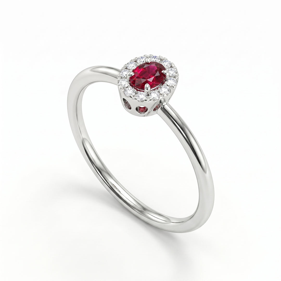 Nihama an 18k 4x3 oval ruby with diamond outline and smooth shank NA5233O4RBC