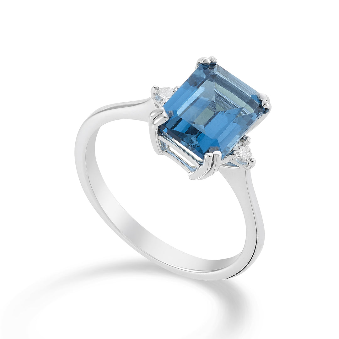 Nihama an 18k octagonal London blue topaz 7x9 ct.2.65 diam. ct.0,08 NACL090DITPBL4O4