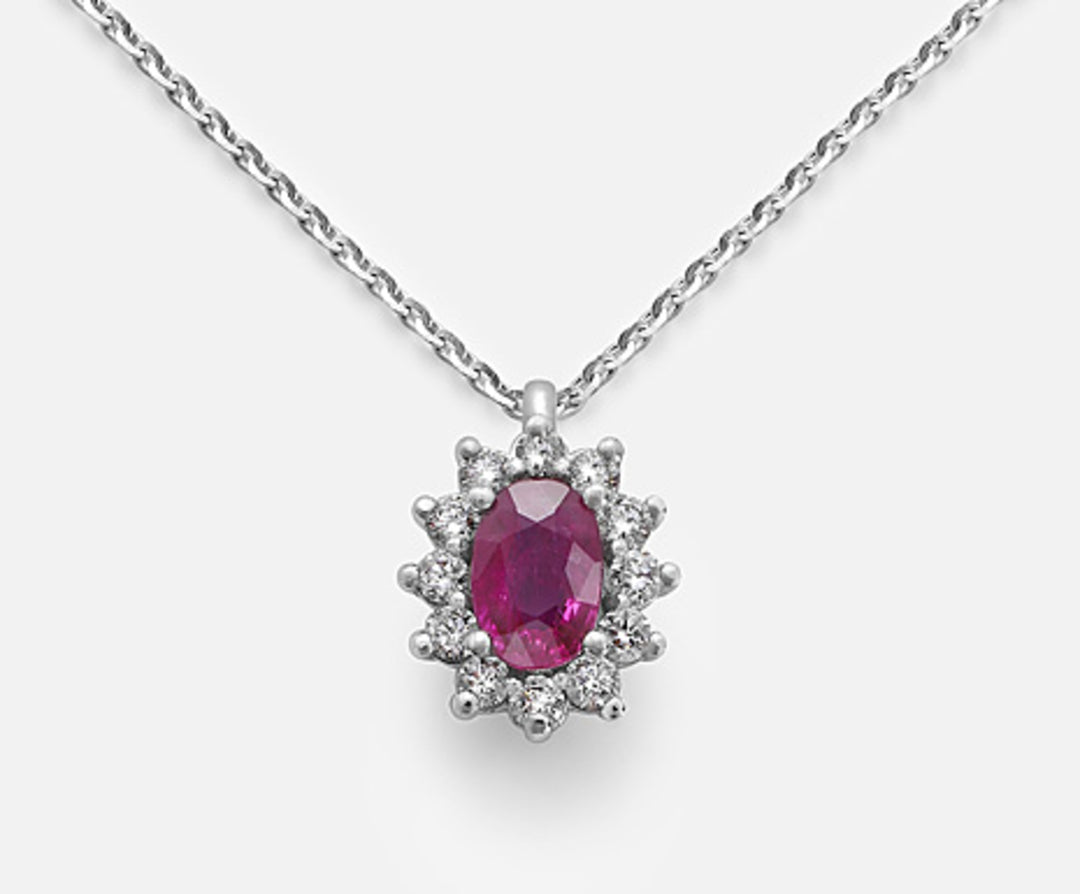 Nihama cl 18k ruby ​​n. oval 6x4 ct.0.62 diam. ct.0.23 ND5047O4RBN062