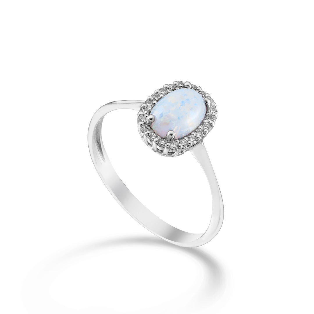 Mikiko een 18k opaal cabochon ovaal 7x5, met diamanten omtrek MA5207O4OP