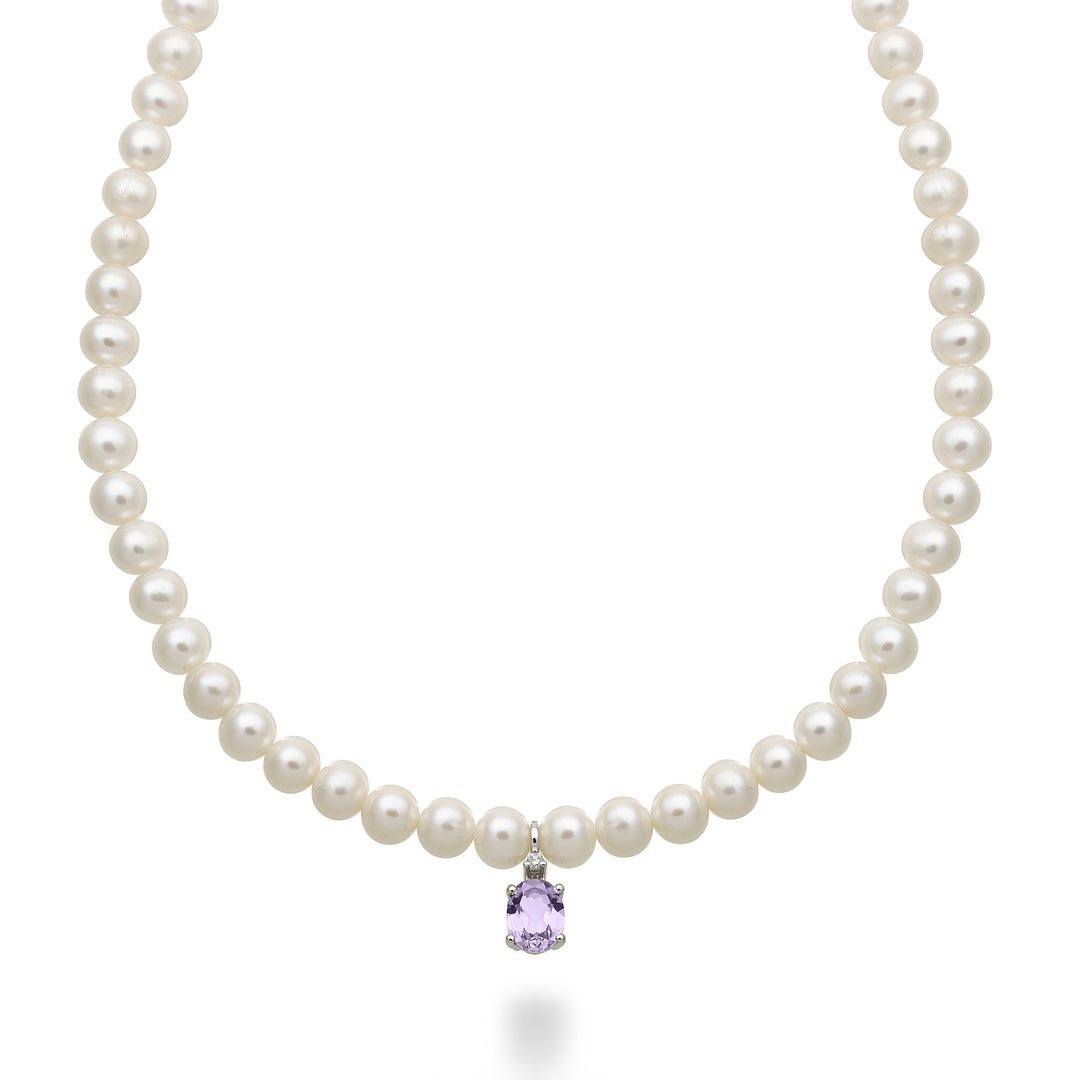 Nihama cl 18k fw 5,5/6 ovaler Amethyst 6x8 ct.1,10 Durchm. 0,02 ct Federring NC1576O4AMET55