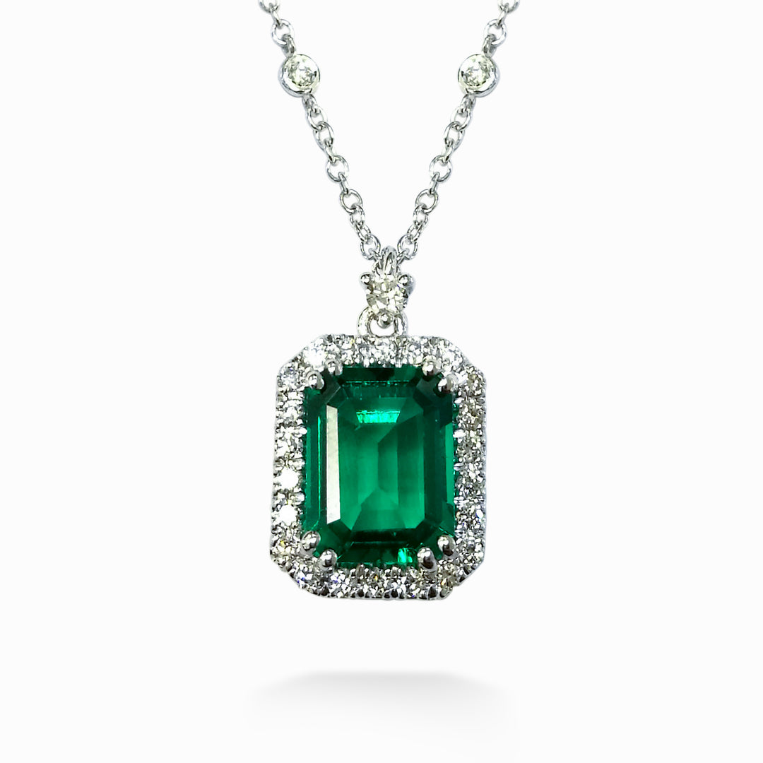 X-Diamond cl 18kt lab g.d. octagonal lab emerald 7x9 ct. 2.25 approximately and contour diam ct. 0.38 LXDPCL072DISM79O4