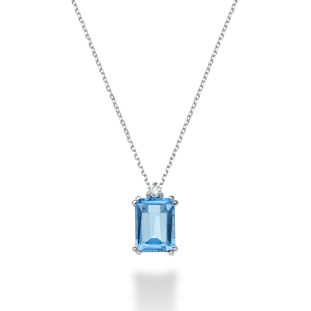 Nihama cl 18k achthoekige blauwe topaas 8x6 ct.2,10 diam. ct.0,03 NPCL090DITPAZ3O4