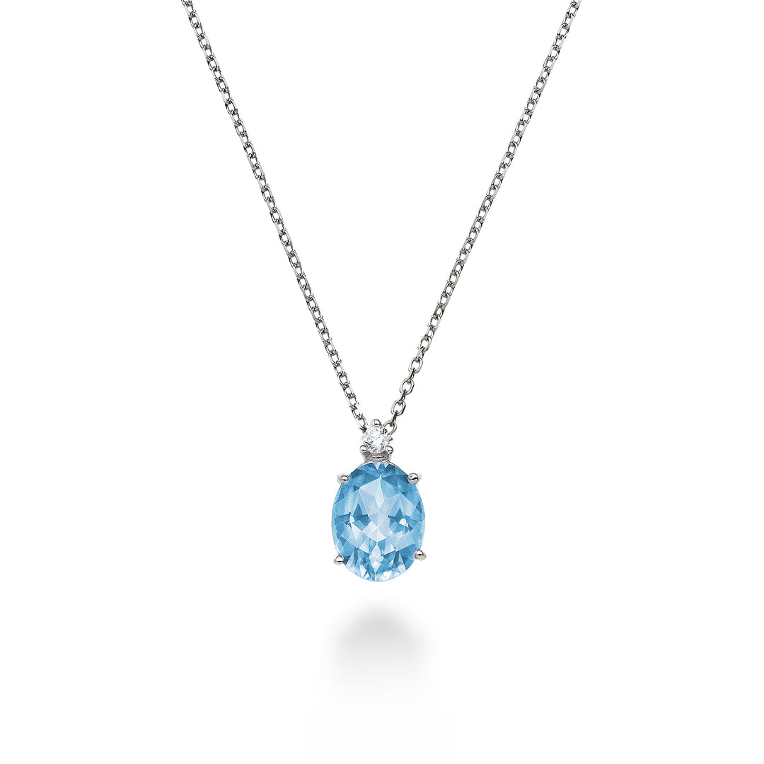 Mikiko cl 18k ovale blauwe topaas 7x5 ct.1,10 diam. ct.0,015 MD5035O4TPAZ