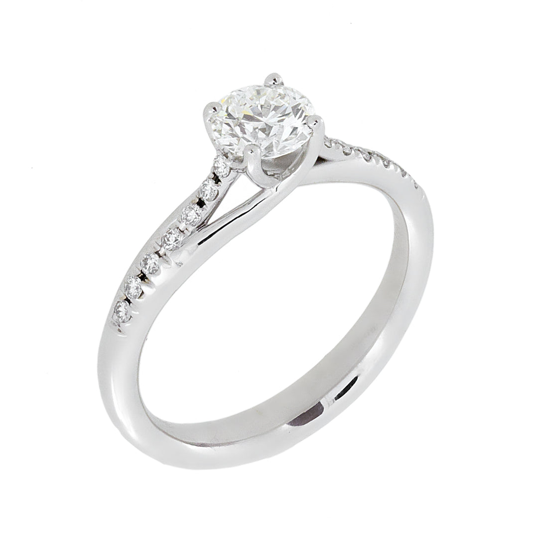 Golay grace solitaire ring with diamonds on the shank. pes ABTRESOL02-21259110034