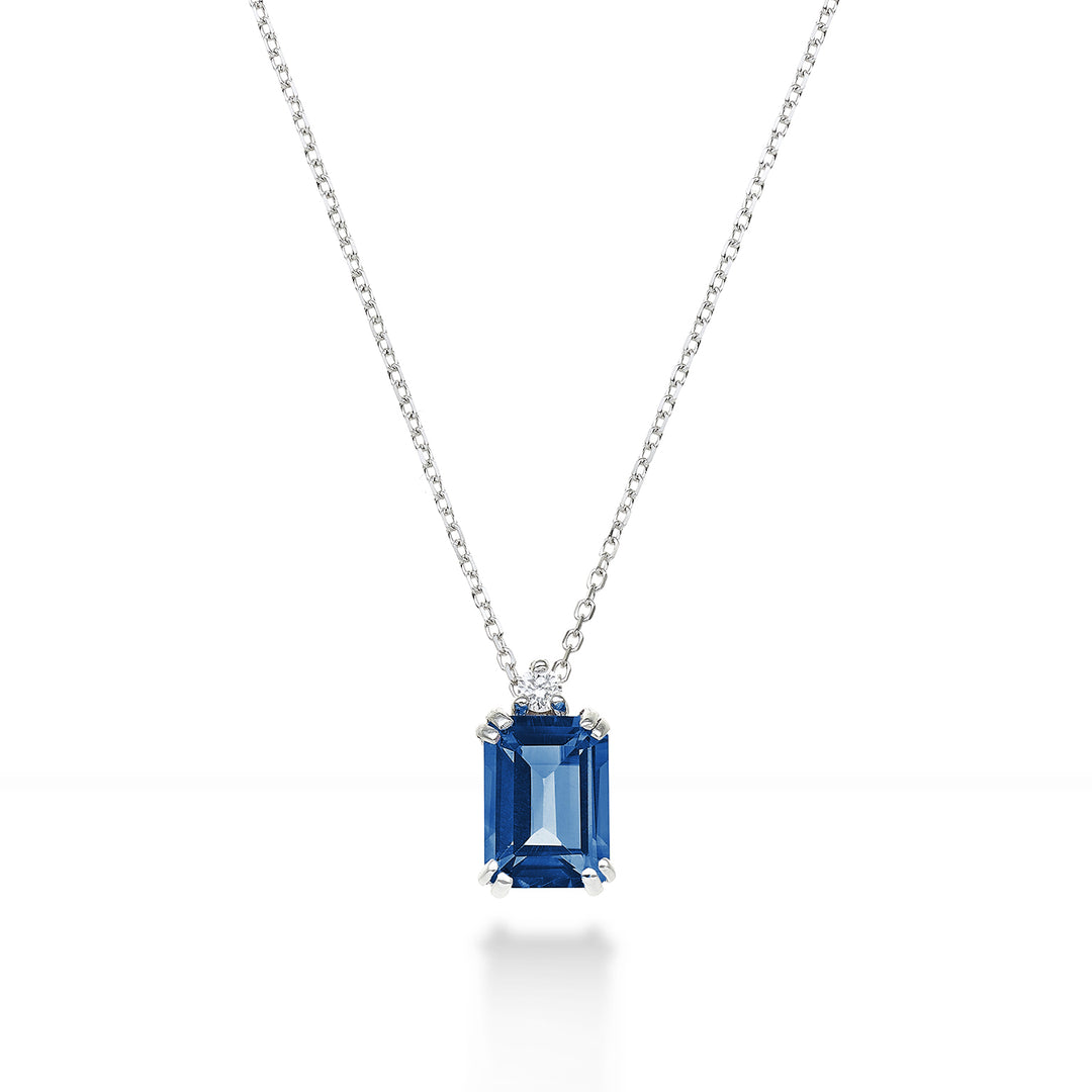 Mikiko cl 18k achteckiger Londoner Blautopas 7x5 ct.1,20 Durchm. ct.0,025 MPCL090DITPBL2O4