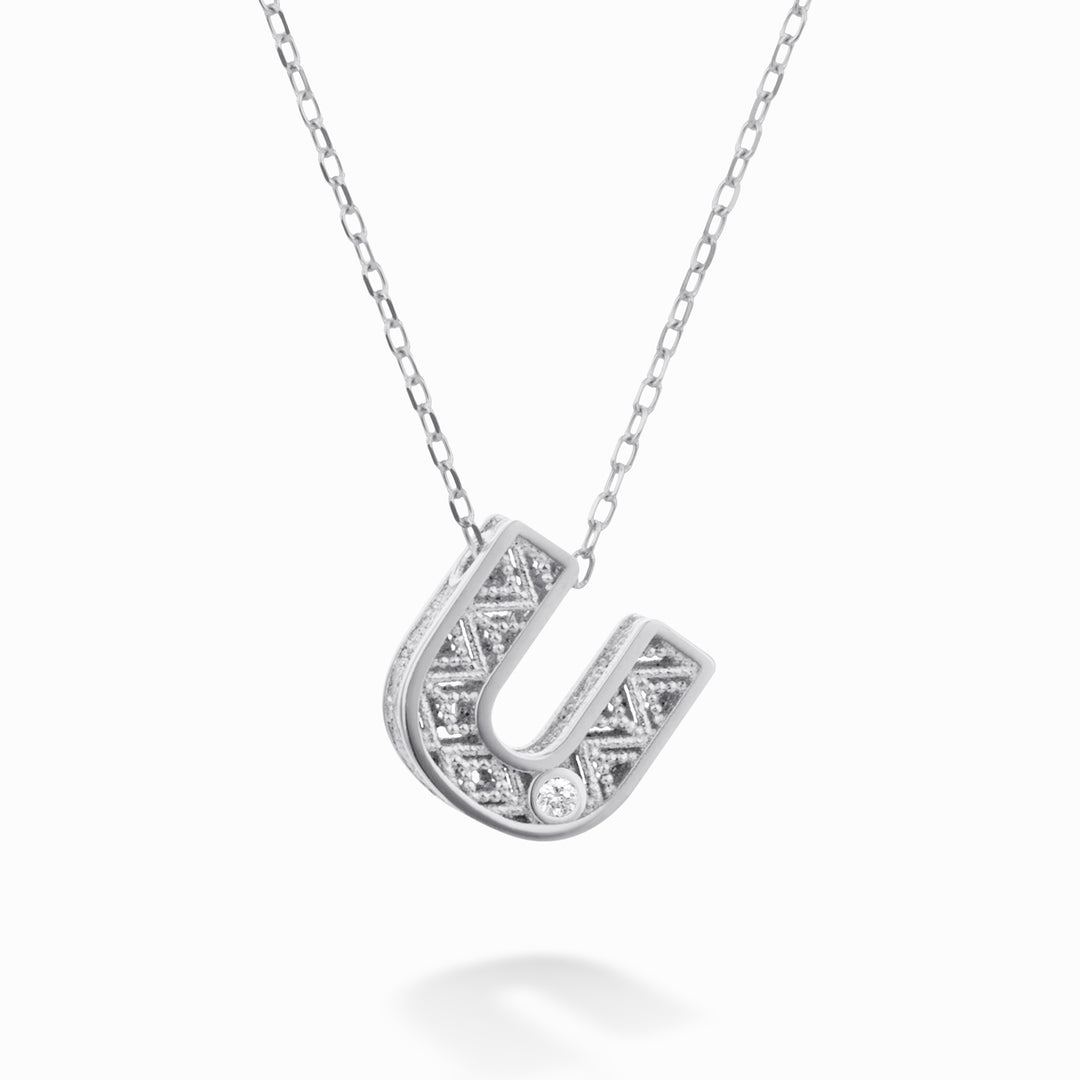 Mikiko cl 18k letter u witgoud diam. ct.0,01 MDLETUO4