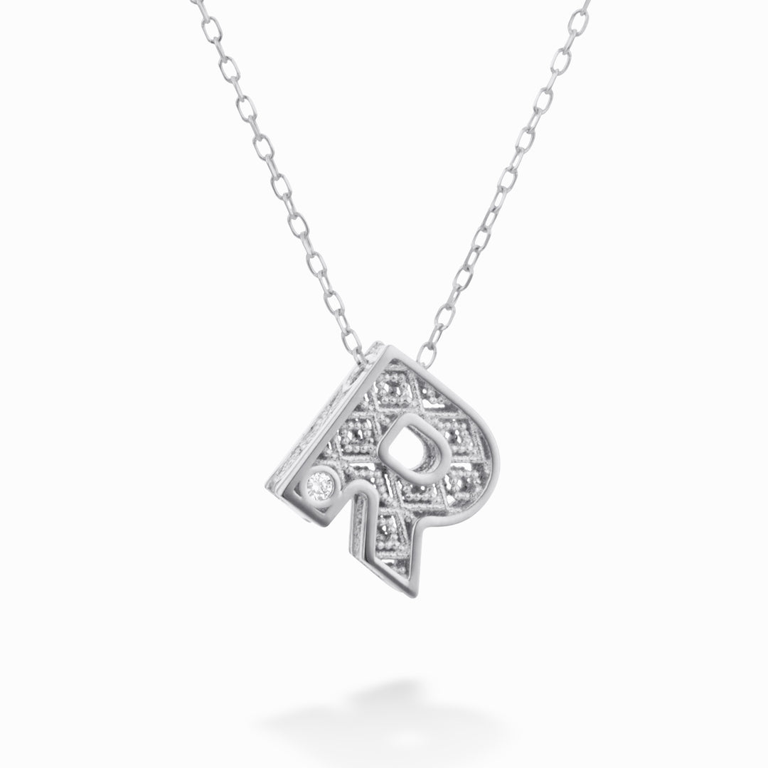 Mikiko cl 18k letter r witgoud diam. 0,01 ct MDLETRO4