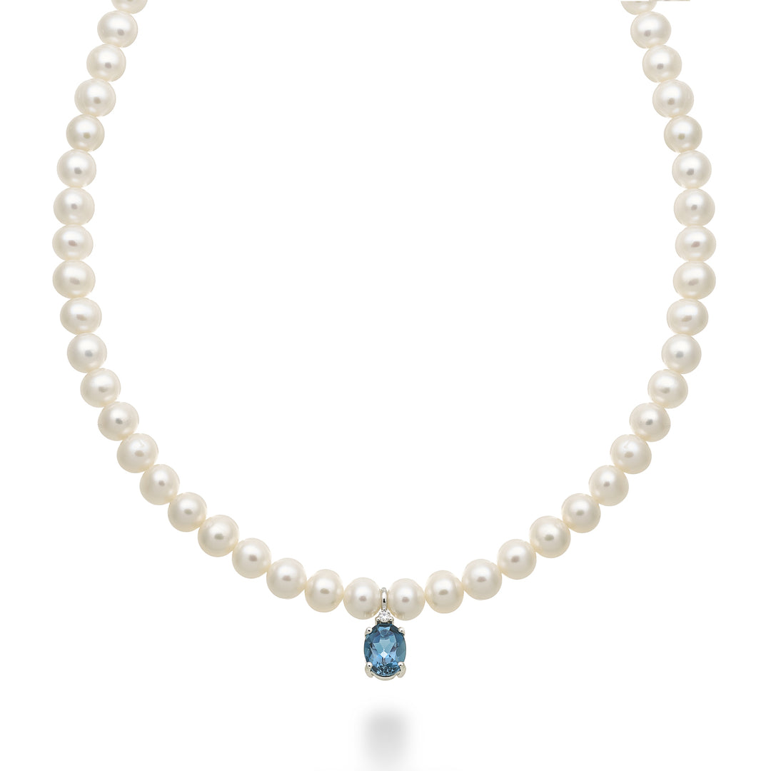 Mikiko cl 18k fw 5,5/6 ovaler Londoner Blautopas 6x8 ct.1,40 Durchm. 0,02 ct Federring MC1576O4TPBL55
