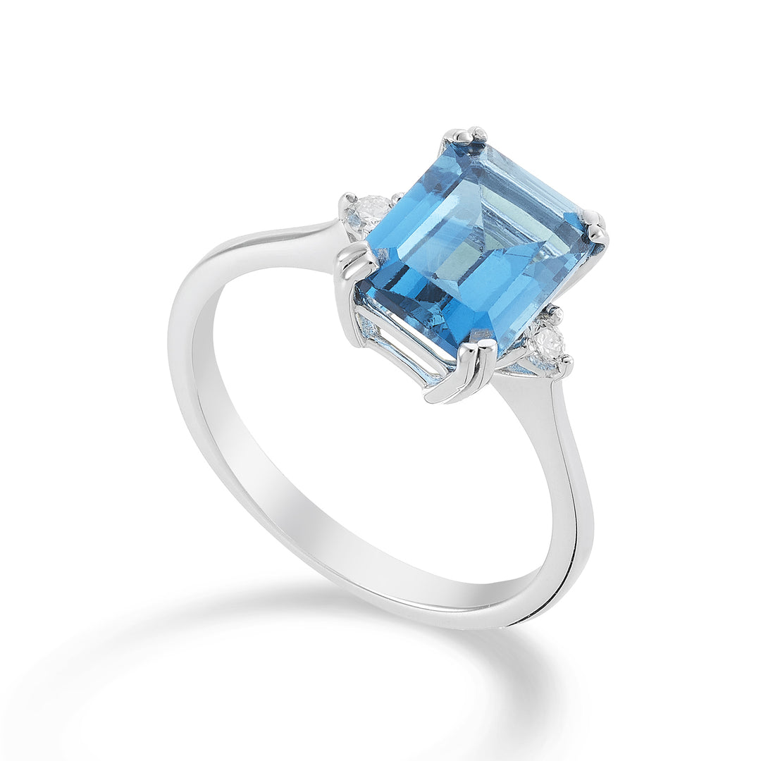 Mikiko een 18k achthoekige blauwe topaas 7x9 ct.2,90 diam. ct.0,08 MACL090DITPAZ4O4