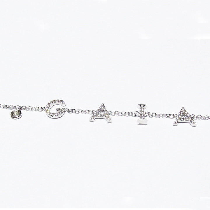 World Diamond Group bracelet with name GAIA in 18kt white gold 2.30g with diamonds 0.17ct color G clarity VVS 0002BR - Gioielleria Capodagli